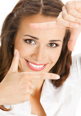 businesswoman framing her face with hands