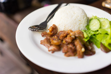 Pork fried rice, put a plate in a restaurant.