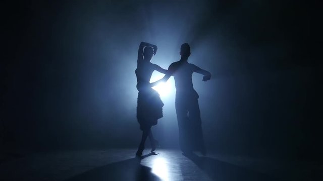 Emotional and graceful latina dance performed by champions, smoky studio