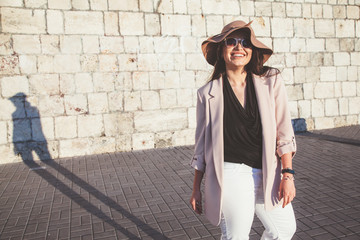 Plus size model wearing fashion clothes in city street