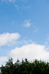 white clouds against blue sky for background.