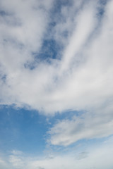 White clouds in the blue sky.