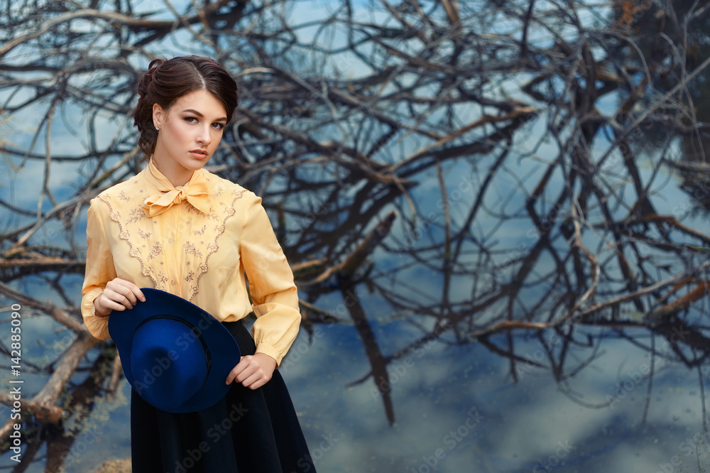 Wall mural portrait of young woman outdoor