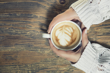 Lonely woman drinking coffee in the morning