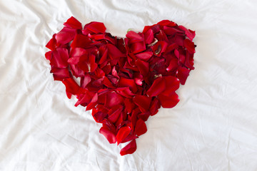 Beautiful heart of red rose petals