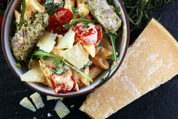 Whole Wheat Pasta Salad with Fresh Arugula, Mozzarella, Roasted Red Bell Peppers and Pesto Sauce
