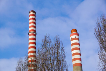 Industrial chimney urban scenery near at power plant