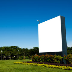 Blank billboard against blue sky.