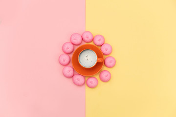 photo of pink marshmallows and cup of coffee on the wonderful background in pop art style