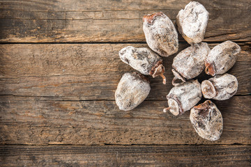 Dried persimmon on wooden background