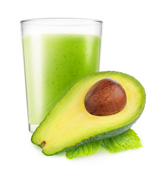 Isolated vegetable smoothie. Glass of avocado drink and half of fruit isolated on white background with clipping path © ChaoticDesignStudio