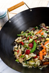 Wok courts with meat