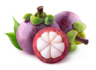 Isolated mangosteens. Two whole fruits and one half isolated on white background with clipping path