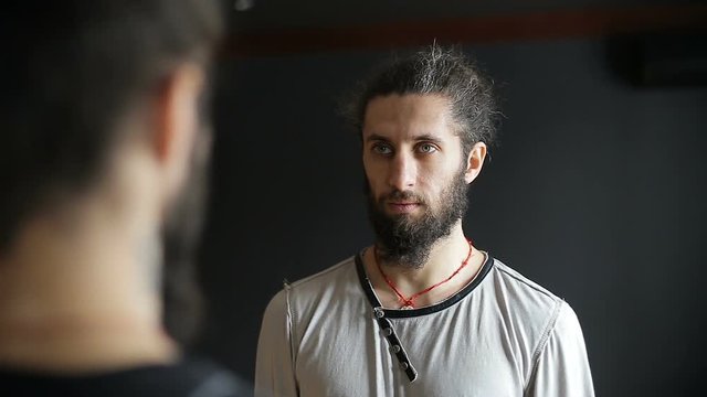 Portrait of the fighters tai chi twin brothers in the training hall