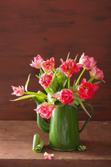beautiful pink tulip flowers bouquet in green pot