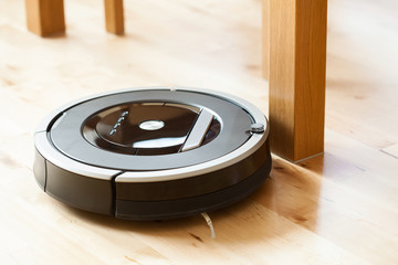 robotic vacuum cleaner on laminate wood floor smart cleaning technology problem