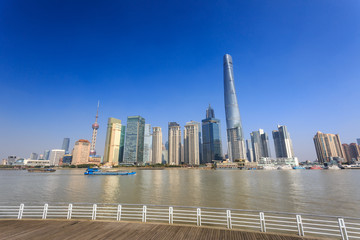 Obraz premium New Pudong skyline, looking across the Huangpu River from the Bund, Shanghai, China, Asia
