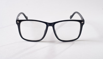 Black glasses on a white background,