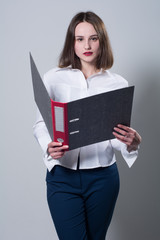 Business young woman with a folder