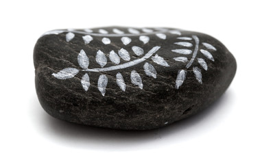 pebble painting - lava pebble with floral design