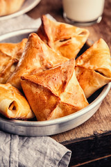 Homemade baked pasties and a glass of milk, Russian cuisine