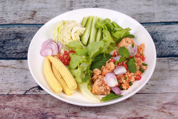 Spicy sour carp eggs of silver barb fish salad