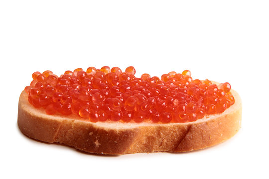 Fish eggs and bread on white background