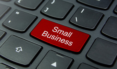 Close-up the Small Business button on the keyboard and have Red color button isolate black keyboard