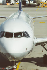 Close-up view of airplane on airfield in airport.