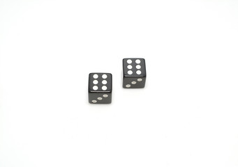 Two dice with number six double isolated on white background.