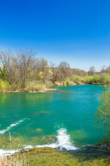      Beautiful landscape, waterfall, clear green water and on Mreznica river in Croatia. Beautiful world. Panoramic view. 