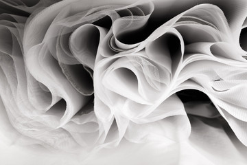 Obraz na płótnie Canvas Abstract soft chiffon texture background. Waves of soft cloth