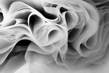 Obraz na płótnie Canvas Abstract soft chiffon texture background. Waves of soft cloth