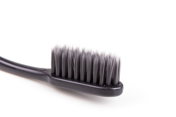 Closeup of toothbrush charcoal soft and slim tapered bristle