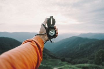 POV image with compass in mountains © Alex Photo