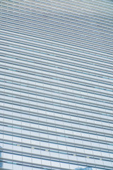 Business Modern architecture close up, texture windows of a high rise building