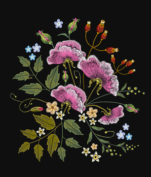 Wild flowers embroidery on black background. Decorative floral embroidery elegant flowers vector