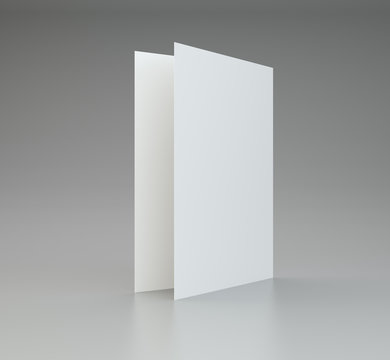 Blank White Brochure On A Gray Background. 3d Rendering