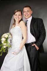 Newly married together in a photo pose