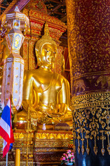 Fototapeta premium Buddha image in church of Wat Phumin, Nan, Thailand 