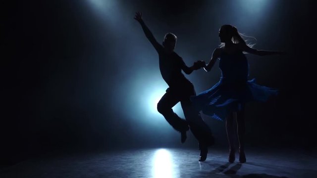 Dance rumba performed by a professional couple in slow motion