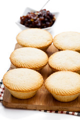 Mince  pie group on cutting board isolated on white