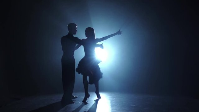 Emotional and graceful salsa dance performed by champions, slow motion