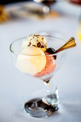 Coffee with milk, or Raw coffee in a tall glass.