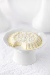 Panna Cotta with with chocolate on light background. North Italian dessert from cream, sugar and vanilla.