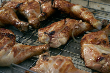 Close-up of Barbecue with Delicious grilled chicken meat on charcoal fire, outdoor grill.Weekend concept.