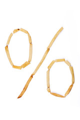 Fototapeta premium Symbol percent sign laid with french fries. Alphabet letter food