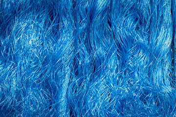 Blue background of swirling ropes