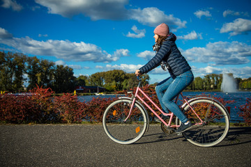 Girl biking in city 