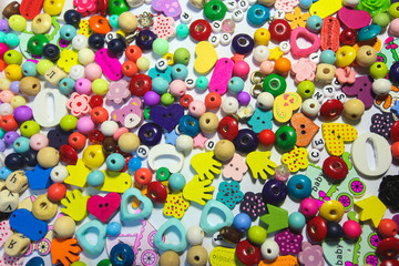 Beads Background. Retro Top View Colorful Bead Heap. child background.